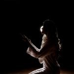 Istikhara Dua saying by a Muslim woman.